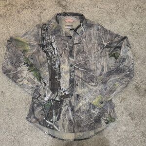 Woman’s camouflage button up shirt